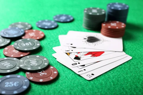 Chips and cards on table in casino