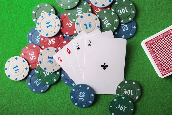 Chips and cards on table in casino