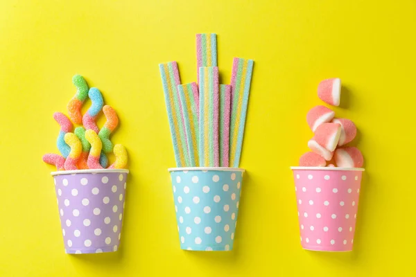 Cups Different Tasty Candies Color Background — Stock Photo, Image
