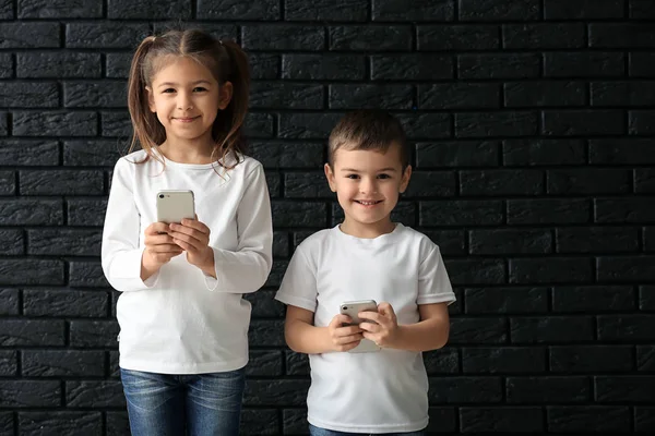 Cute Little Children Playing Smartphones Dark Background — Stock Photo, Image
