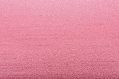 Arka plan olarak pembe ahşap yüzey