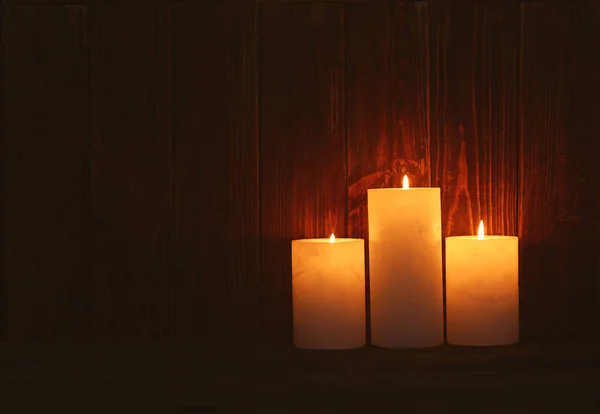 Beautiful Burning Candles Dark Wooden Background — Stock Photo, Image