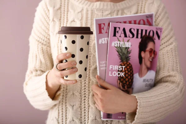 Young Woman Holding Cup Coffee Magazines Color Background Closeup — Stock Photo, Image