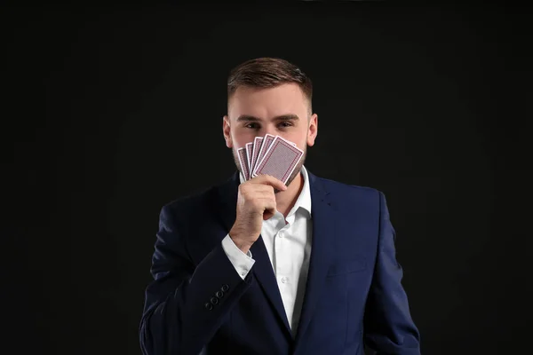 Handsome Man Cards Dark Background — Stock Photo, Image