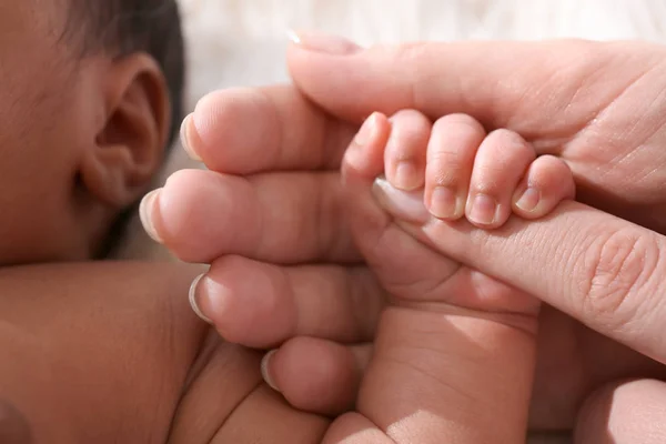 Cute Little Baby Holding Mother Finger Closeup — Stock Photo, Image