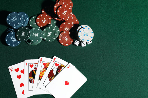 Cards and chips on table in casino