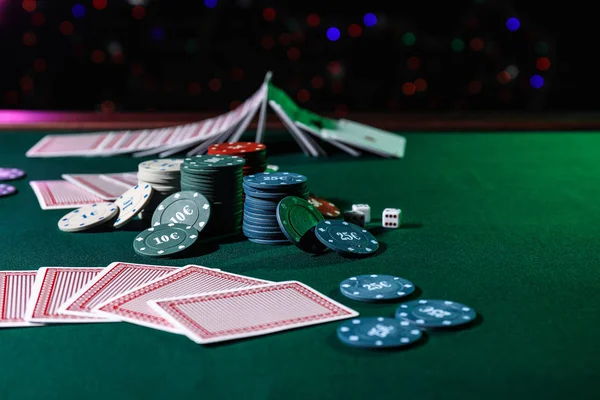 Chips and cards on table in casino