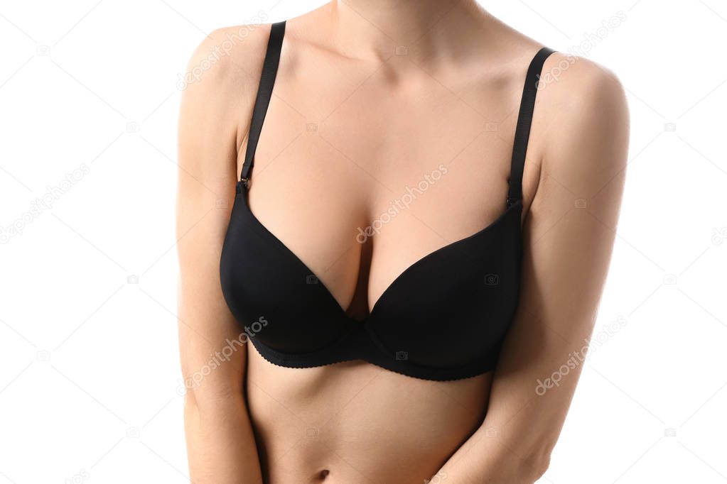 Young woman with beautiful breast on white background