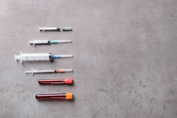 Syringes Test Tubes Blood Grey Background Health Care Concept — Stock Photo, Image