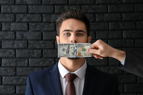 Man Bribe Covering Mouth Businessman Dark Brick Background Concept Corruption — Stock Photo, Image