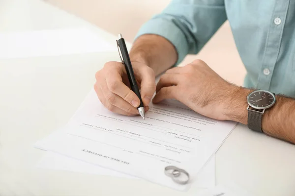 Young Man Signing Decree Divorce Table Closeup — Stock Photo, Image