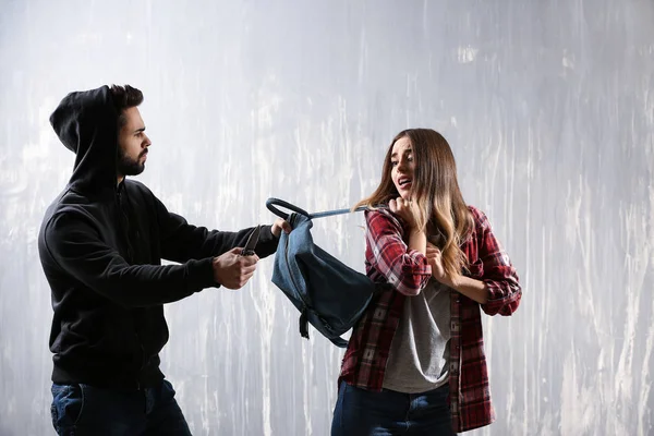 Male Thief Stealing Bag Young Woman Grunge Background — Stock Photo, Image