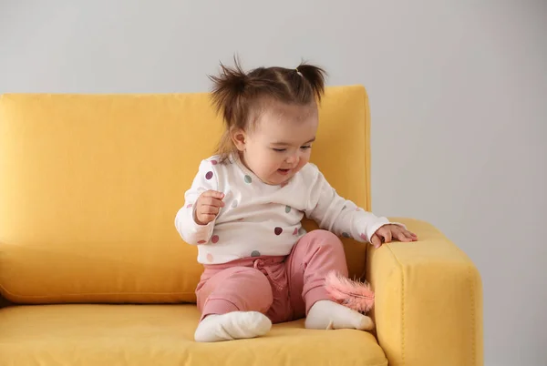 Cute Baby Girl Sitting Armchair Light Background — Stock Photo, Image