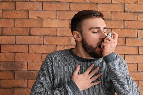 Young Man Inhaler Having Asthma Attack Brick Wall — Stock Photo, Image