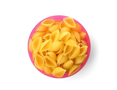Uncooked conchiglie pasta on white background