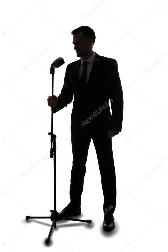 Silhouette of young singer on white background
