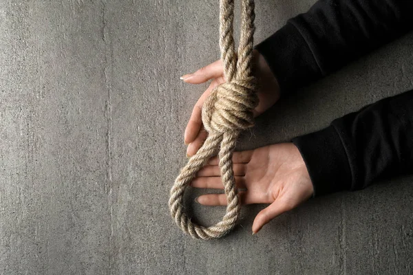 Female Hands Rope Loop Grey Background Suicide Concept — Zdjęcie stockowe