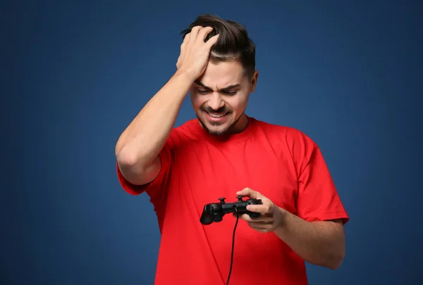 Young Man Losing Video Game Color Background — Stock Photo, Image