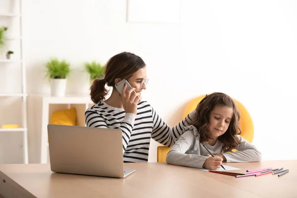 Busy Mother Daughter Working Home — Stock Photo, Image