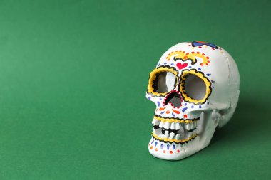Meksika'nın ölüler günü ' renk arka plan üzerinde için insan kafatası boyalı