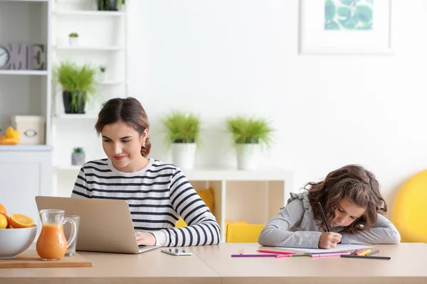 Busy Mother Daughter Working Home — Stock Photo, Image