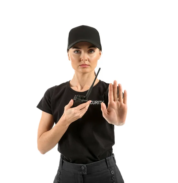 Female security guard showing Stop gesture on white background