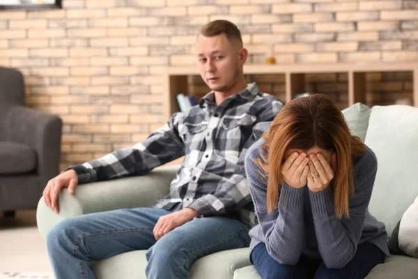 Unhappy couple after quarrel at home. Concept of divorce