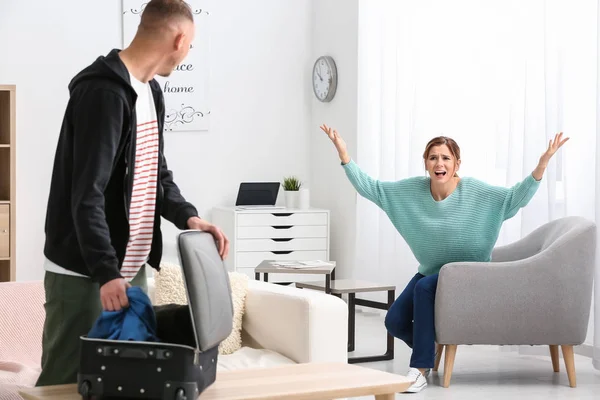 Unhappy Man Packing Belongings While Wife Shouting Him Concept Divorce — Stock Photo, Image