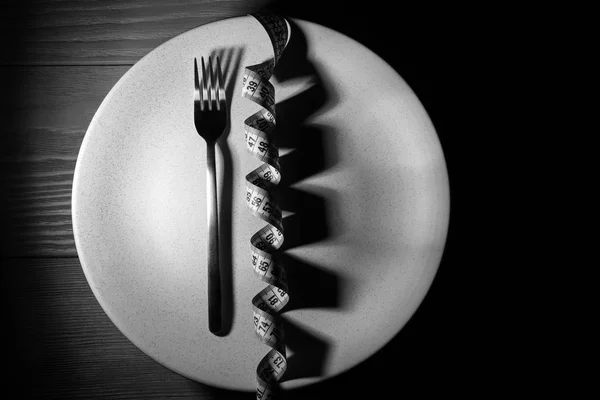 Plate Fork Measuring Tape Dark Wooden Table Diet Concept — Stock Fotó