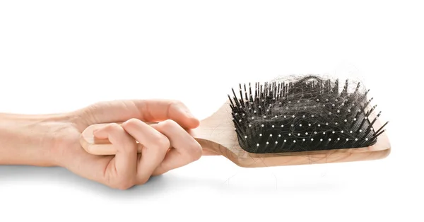 Female Hand Holding Brush Fallen Hair White Background — Stockfoto