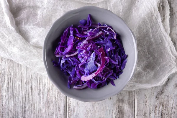 Bowl with tasty fermented cabbage on wooden table — Stock Image Bowl Tasty Fermented Cabbage Wooden Table Royalty Free Stock Images