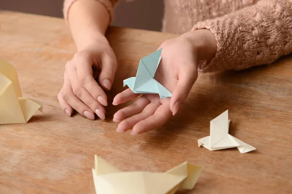 Young Woman Origami Bird Table Closeup — Stock Photo, Image