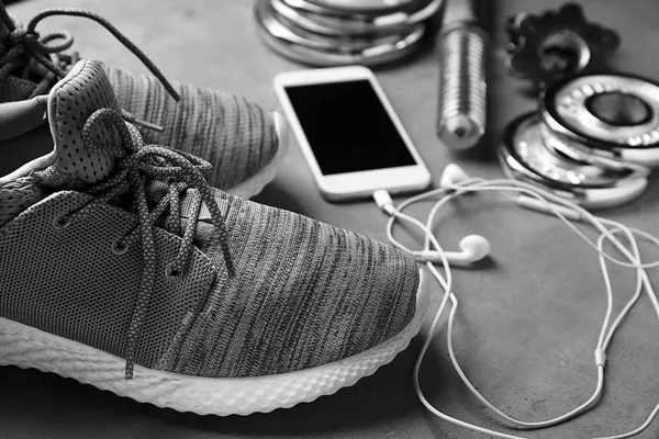 Sportive Shoes Mobile Phone Earphones Grey Background — Stock Photo, Image