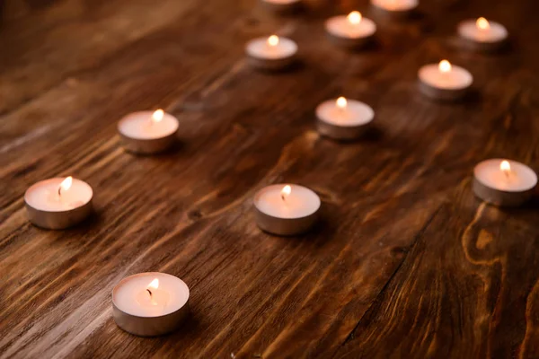 Small Burning Candles Wooden Table — Stock Photo, Image