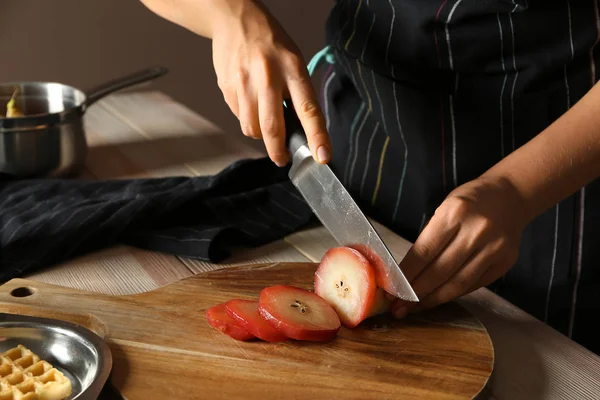 Woman Cutting Sweet Pear Stewed Wine Kitchen Table — Stock Photo, Image