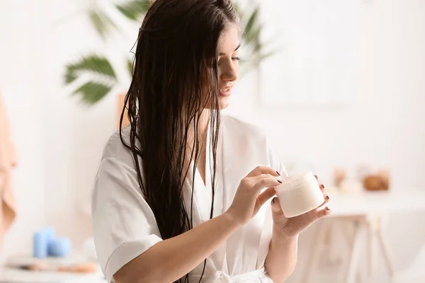 Young Woman Applying Cream Beautiful Long Hair Bathroom — Stock Photo, Image