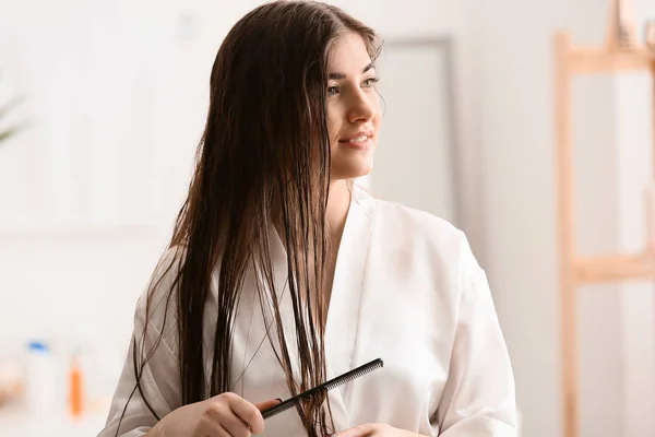 Young Woman Combing Beautiful Long Hair Bathroom — Stock Photo, Image