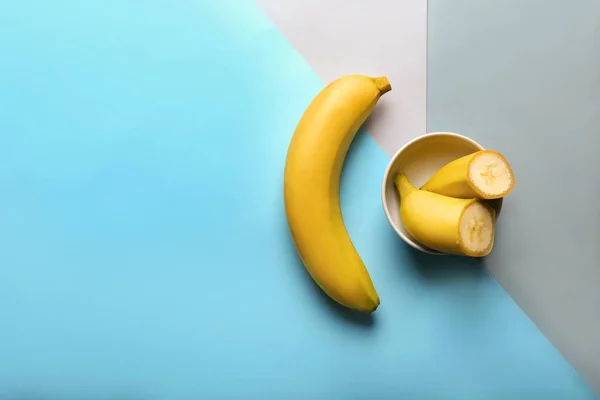 Tasty Cut Bananas Color Background — Stock Photo, Image