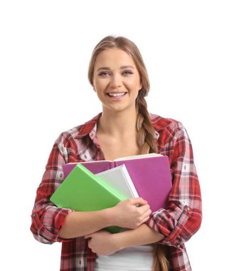 Beyaz arka plan kitapları olan güzel bir genç kadın.