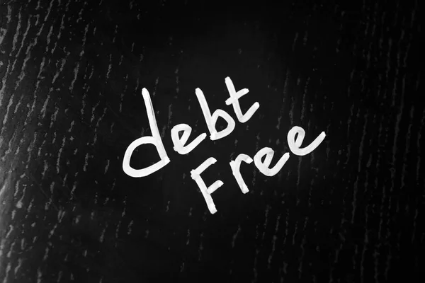 Текст Debt Безкоштовно Темному Фоні — стокове фото