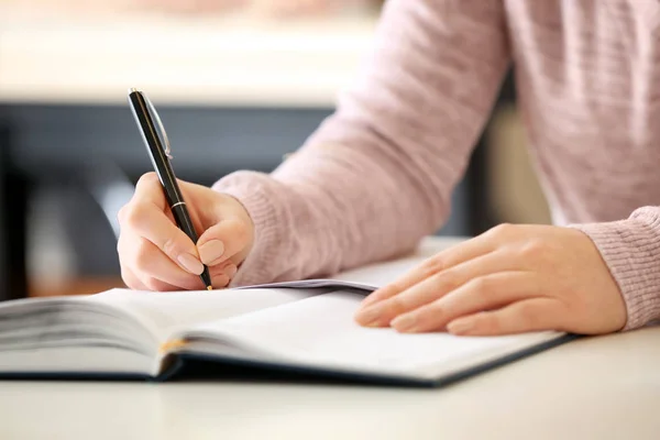 Girl passing school test