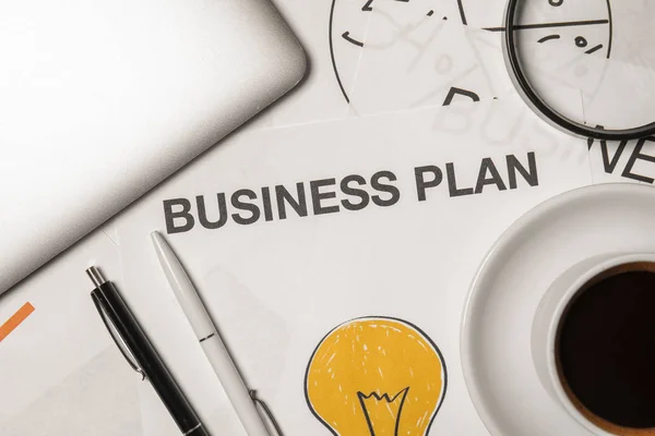 Arkusz Papieru Tekstem Business Plan Stole — Zdjęcie stockowe