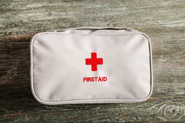 First Aid Kit Wooden Background — Stock Photo, Image