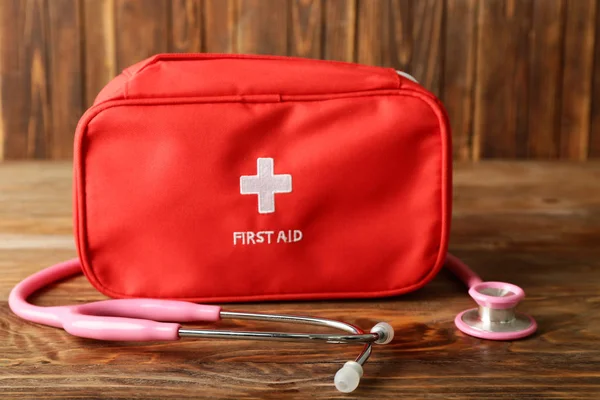 First Aid Kit Wooden Background — Stock Photo, Image