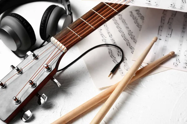 Composition Guitar Headphones Music Sheets White Background — Stock Photo, Image