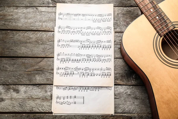 Guitar Music Sheets Wooden Background — Stock Photo, Image