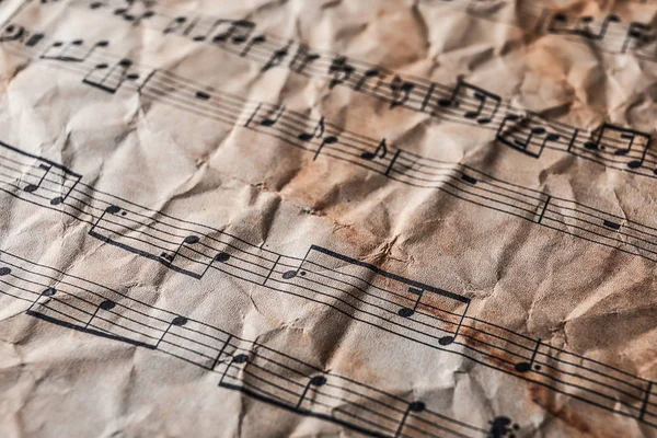 Old Crumpled Music Sheet Closeup — Stock Photo, Image