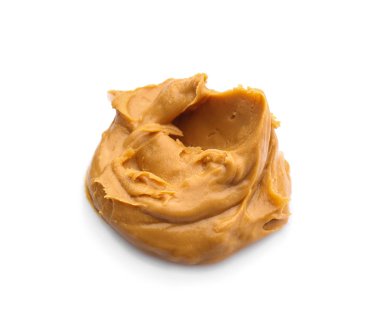 Beyaz arka planda lezzetli fıstık ezmesi.