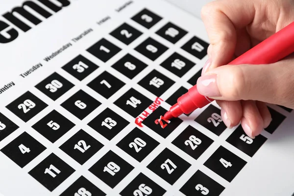 Woman Writing Text Flu Shot Calendar Marking Date Closeup — Stock Photo, Image