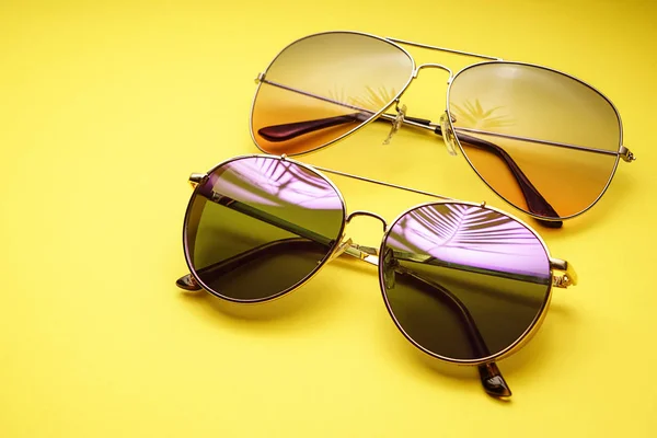 Different Stylish Sunglasses Color Background — Stock Photo, Image